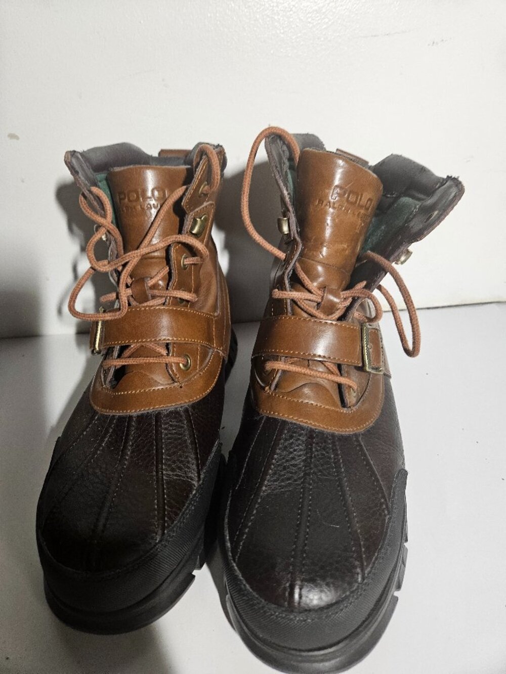 Men’s size 11.5 Polo Ralph Lauren duck boots in brown/black leather.